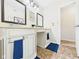 This bathroom has double sinks and vanities with granite countertops at 5542 N Olivia Dr, Alexandria, IN 46001