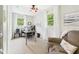 Comfortable office area with windows, desk, chair, and plenty of sunlight at 5542 N Olivia Dr, Alexandria, IN 46001