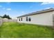 Backyard with a well-maintained lawn and a fenced perimeter at 560 Tracy Ln, Brownsburg, IN 46112