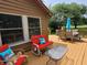 View of back deck seating area and outdoor table and chairs at 5730 S 50 W, Trafalgar, IN 46181