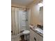 Bathroom featuring updated vanity, toilet, and shower with curtain at 5730 S 50 W, Trafalgar, IN 46181