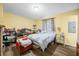 A cozy bedroom with a window providing natural light and a comfortable place to unwind at 5730 S 50 W, Trafalgar, IN 46181