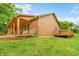 Charming exterior of a house with a covered porch, a stone foundation and a well-maintained lawn at 5730 S 50 W, Trafalgar, IN 46181
