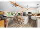 Charming eat-in kitchen featuring stainless appliances, an island with barstool seating and an open floor plan at 5730 S 50 W, Trafalgar, IN 46181