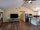 Spacious open floor plan with hardwood floors, island kitchen, and comfortable living area at 5730 S 50 W, Trafalgar, IN 46181