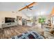 Bright and airy living space featuring hardwood floors, a modern kitchen, and plenty of natural light at 5730 S 50 W, Trafalgar, IN 46181