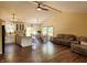 Bright and airy open-concept living space featuring hardwood floors and an island kitchen at 5730 S 50 W, Trafalgar, IN 46181