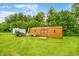 Exterior shot of outdoor storage shed on large, grassy property at 5730 S 50 W, Trafalgar, IN 46181