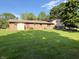 Large backyard with a shed and mature trees at 5730 Teresa Dr, Alexandria, IN 46001