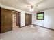 Bedroom featuring natural light, double closets and neutral carpet at 5730 Teresa Dr, Alexandria, IN 46001