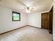 Bedroom featuring natural light, double closets and neutral carpet at 5730 Teresa Dr, Alexandria, IN 46001