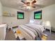 Brightly lit bedroom with a desk area and stylish decor at 5730 Teresa Dr, Alexandria, IN 46001