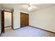 A neutral bedroom with plush carpet and a large closet at 5730 Teresa Dr, Alexandria, IN 46001