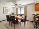 Elegant dining room featuring modern lighting, neutral color scheme and plenty of seating at 5730 Teresa Dr, Alexandria, IN 46001