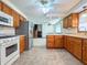 View of well-equipped kitchen showing access to the living room. Oak cabinets and modern appliances at 5730 Teresa Dr, Alexandria, IN 46001