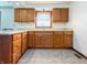 Spacious kitchen boasting oak cabinets, modern countertops, and ample storage space at 5730 Teresa Dr, Alexandria, IN 46001