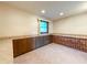A light room with brick accent, carpeted floors and natural light at 5730 Teresa Dr, Alexandria, IN 46001
