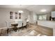 Dining room with vaulted ceilings, elegant table set, and natural light at 5873 N Victoria Dr, Indianapolis, IN 46228