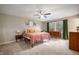 Cozy bedroom featuring neutral paint, plush carpet, and ample natural light at 5873 N Victoria Dr, Indianapolis, IN 46228