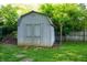 Charming storage shed in a backyard setting, providing additional outdoor storage space at 5873 N Victoria Dr, Indianapolis, IN 46228