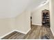 Attic features a wood floor and a sloped ceiling at 6010 Lakeside Manor Ave, Indianapolis, IN 46254