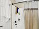 Clean bathroom with a shower and updated fixtures at 6010 Lakeside Manor Ave, Indianapolis, IN 46254
