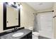 Updated bathroom featuring granite countertops, tub, and a shower at 6010 Lakeside Manor Ave, Indianapolis, IN 46254