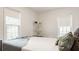 Cozy bedroom featuring natural light and a comfortable bed, perfect for relaxation at 6040 Crittenden Ave, Indianapolis, IN 46220
