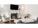 A beautifully decorated living room featuring a fireplace and marble coffee table at 6040 Crittenden Ave, Indianapolis, IN 46220