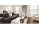 Elegant living room with hardwood floors, and a comfortable sofa at 6040 Crittenden Ave, Indianapolis, IN 46220