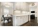 Walk in Pantry features white cabinets, white countertops, and hardwood floors at 6040 Crittenden Ave, Indianapolis, IN 46220