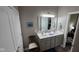 Well-lit bathroom features a double sink vanity and modern finishes at 6184 Farlin Dr, Whitestown, IN 46075