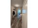 Hallway features a bench, coat hooks, and neutral tones at 6184 Farlin Dr, Whitestown, IN 46075