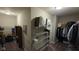 Spacious walk-in closet offers ample storage and organization solutions at 6184 Farlin Dr, Whitestown, IN 46075