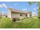 Spacious backyard with patio, landscaping, and mature lawn at 6369 Clary Ln, Greenwood, IN 46143