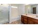 Bathroom with double sink vanity, soaking tub, and glass shower at 6369 Clary Ln, Greenwood, IN 46143