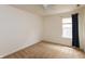 Bedroom with neutral carpet and a large window with curtain at 6369 Clary Ln, Greenwood, IN 46143