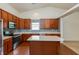 Spacious kitchen with a center island, stainless steel appliances, and ample cabinet space at 6369 Clary Ln, Greenwood, IN 46143