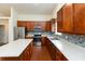 Modern kitchen with stainless steel appliances, a center island, and stylish backsplash at 6369 Clary Ln, Greenwood, IN 46143