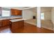 View of kitchen island with sink looking out to living room at 6369 Clary Ln, Greenwood, IN 46143
