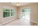 Sunroom with multiple windows overlooking the fenced backyard at 6369 Clary Ln, Greenwood, IN 46143