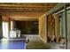 Unfinished basement with concrete floor, exposed wood ceiling and wall studs provides potential for customization at 6377 Harvey Dr, Plainfield, IN 46168