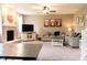 Cozy living room with fireplace and plush sofas at 6377 Harvey Dr, Plainfield, IN 46168