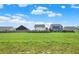 Large grassy backyard with privacy fences at 6645 Honeysuckle Way, Pendleton, IN 46064
