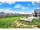 Backyard featuring a patio, wooden deck, privacy fence, and grass at 6645 Honeysuckle Way, Pendleton, IN 46064