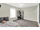Cozy bedroom featuring neutral walls, carpet, and soft natural light at 6645 Honeysuckle Way, Pendleton, IN 46064