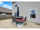 Charming outdoor patio area with table, chairs, and privacy umbrella at 6645 Honeysuckle Way, Pendleton, IN 46064