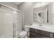 Bathroom with shower and modern dark wood vanity with chrome faucet at 6923 Bryant Pl, Plainfield, IN 46168