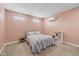 Comfortable bedroom featuring neutral walls, cozy carpet, and modern climate control system at 6923 Bryant Pl, Plainfield, IN 46168