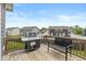 Deck featuring a built-in grill and bench seating, perfect for outdoor entertaining at 6923 Bryant Pl, Plainfield, IN 46168